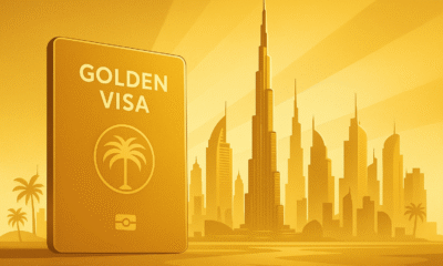 Stylised golden illustration of Dubai skyline with golden passport card representing the UAE Golden Visa program